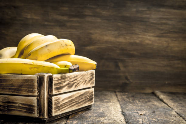 istock box of fresh bananas. 903230182