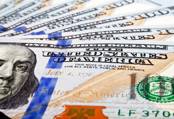 istock Background with money american hundred dollar bills 903230294