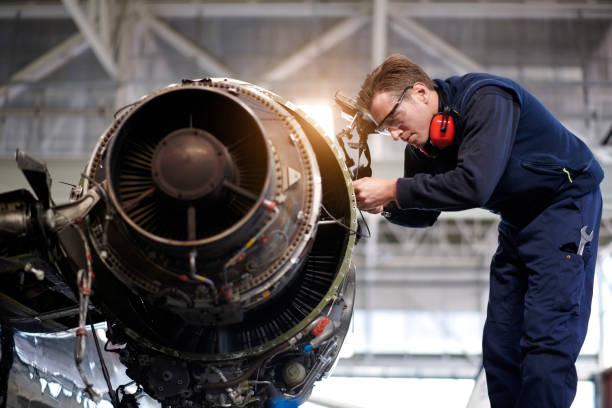istock Aircraft mechanics in the hangar 903232442