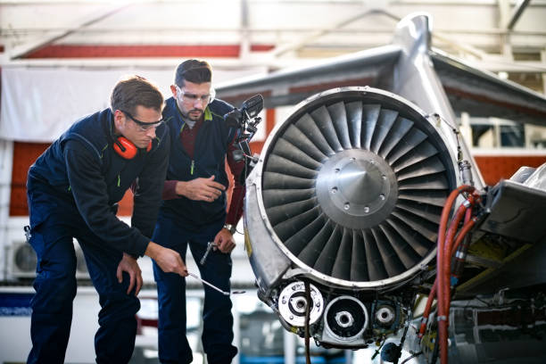 istock Aircraft mechanics in the hangar 903232574