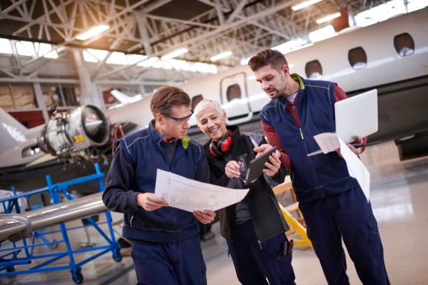 istock Aircraft mechanics in the hangar 903232648