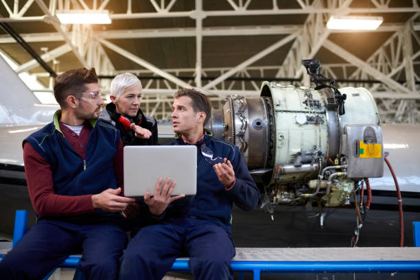 istock Aircraft mechanics in the hangar 903232668