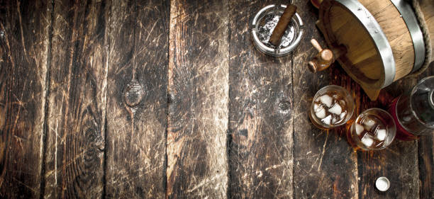 istock barrel of Scotch whiskey with a glass. 903233254
