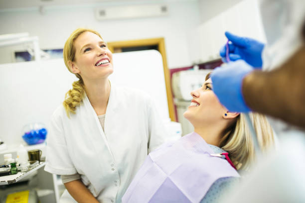 istock Young medical expert examining patient 903235036