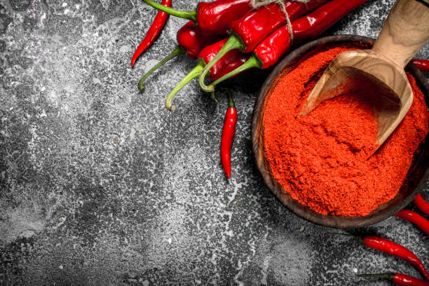 istock Ground chili peppers in a bowl. 903235112