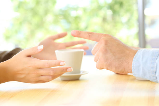 istock Friends hands arguing in a restaurant or home 903237310