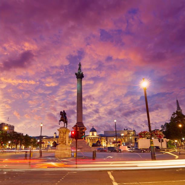 London Trafalgar Square sunset Nelson column London Trafalgar Square sunset Nelson column in England paisaje urbano stock pictures, royalty-free photos & images