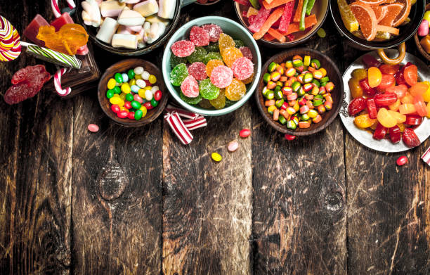 istock Different sweet candy, jelly, marshmallows and candied fruits. 903250126