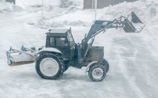 istock Tractor Cleans Ice Rink from Snow 903252614