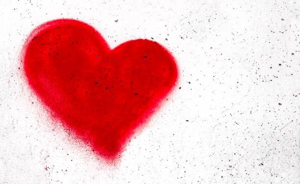 istock Red heart on concrete wall 903253360