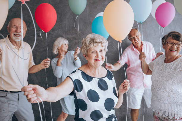 Friends with colorful balloons
