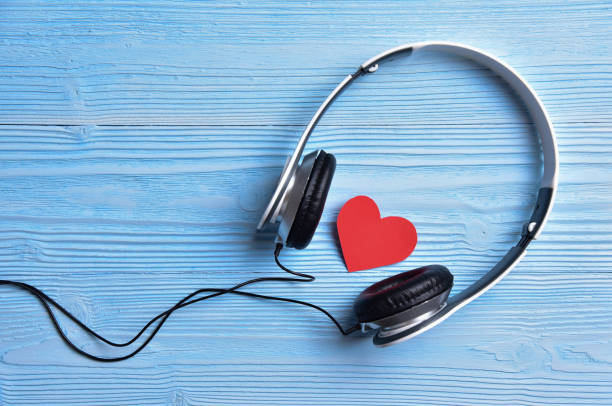 istock A white Headphone with a red heart. 903254160