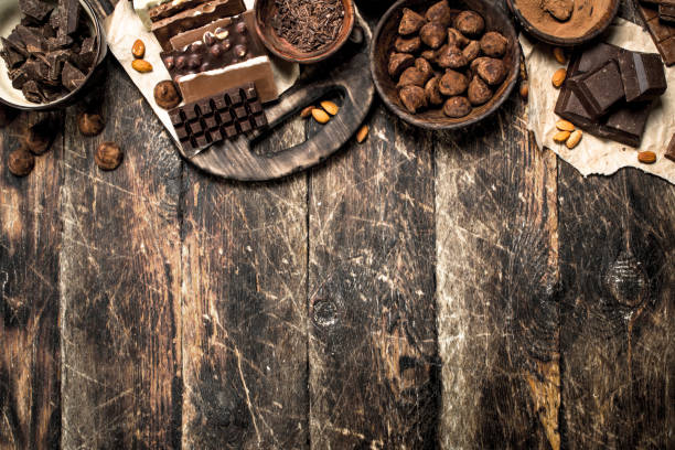 istock Chocolate bars with truffles and cocoa powder. 903256840