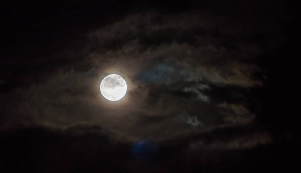 istock Full Supermoon in Clouds over Italy 903257024