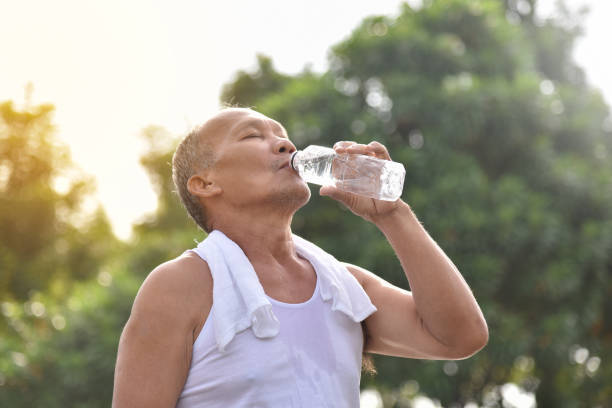 istock Asian senior male drinking water. 903261370