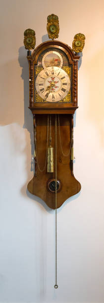istock Brass weight on an old dutch clock 903264650