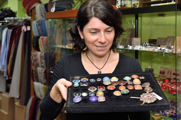 istock woman buying some jewelry 903264768