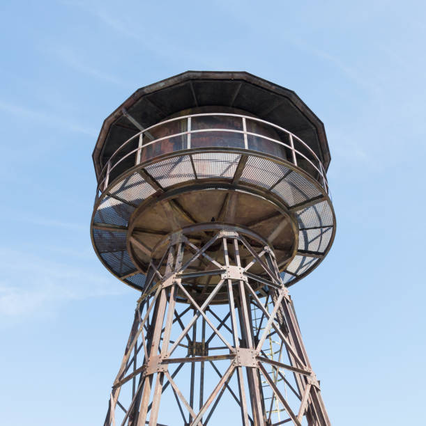 istock Old water tower at a railway station 903266588