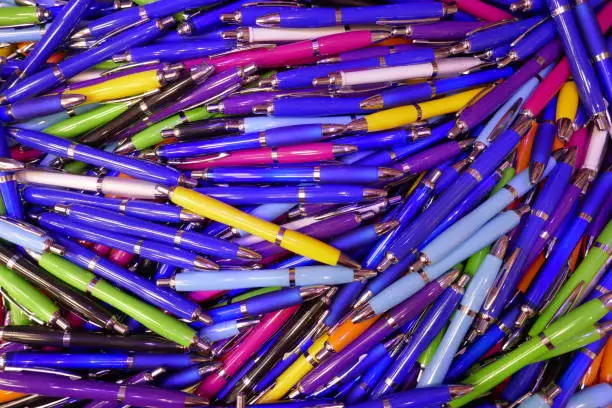 A big heap of many colorful ball pens