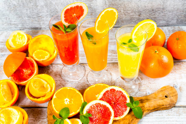 istock freshly squeezed orange juice, lemon and grapefruit 903273644
