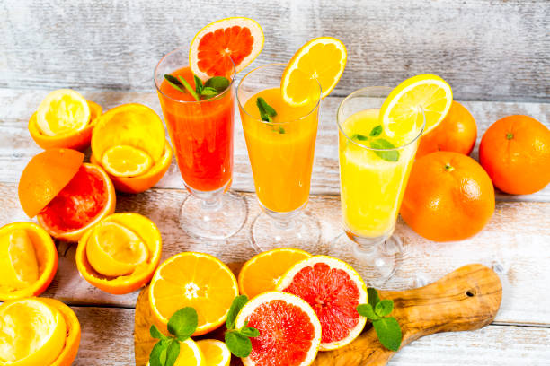 istock freshly squeezed orange juice, lemon and grapefruit 903273770