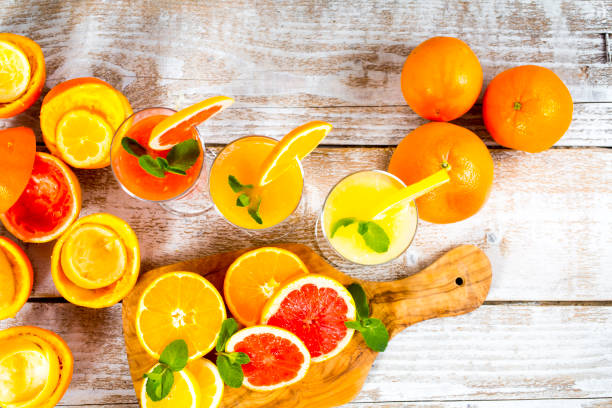 istock freshly squeezed orange juice, lemon and grapefruit 903274174