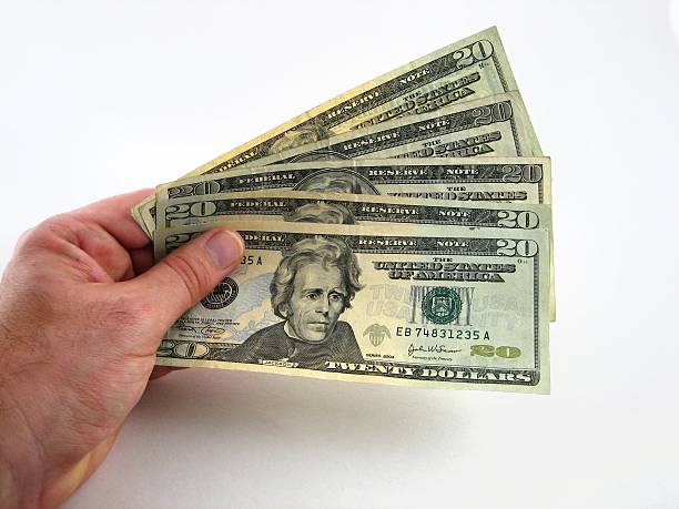 money on hand person handling money mullah photos stock pictures, royalty-free photos & images