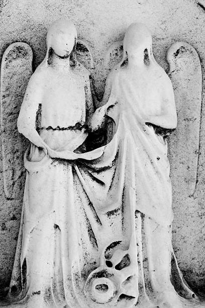 dois anjos - etching tan stone textured imagens e fotografias de stock