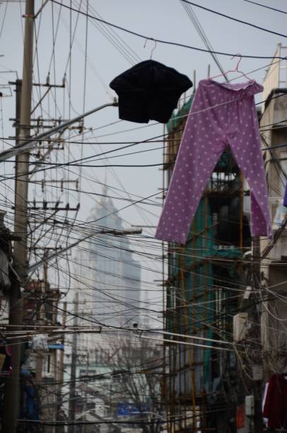 istock Hanging dresses in Xiaonanmen, Shanghai, China 903282146