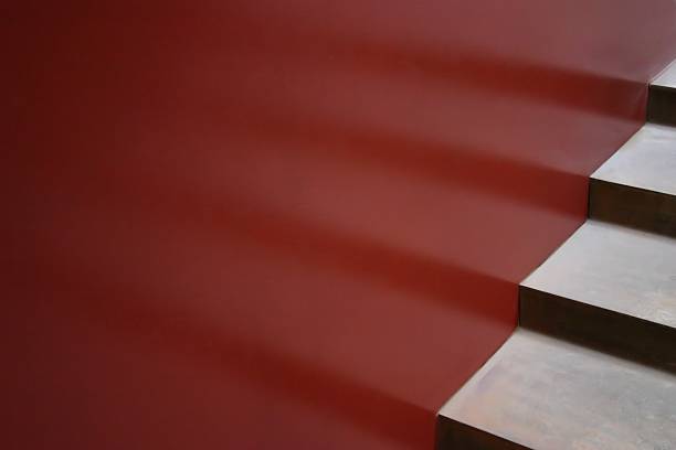 istock Modern Architectural stair treads and risers with reflection on red 90328655