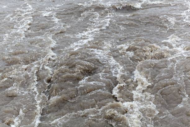 istock Turbulent brown and dirty water 903293050