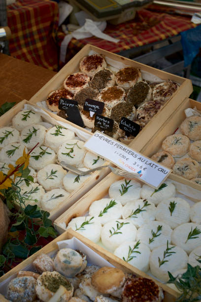 istock Market stall offering goat cheese 903301882