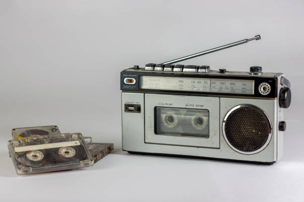 istock old radio and cassette recorder with cassettes isolated on white background 903305434