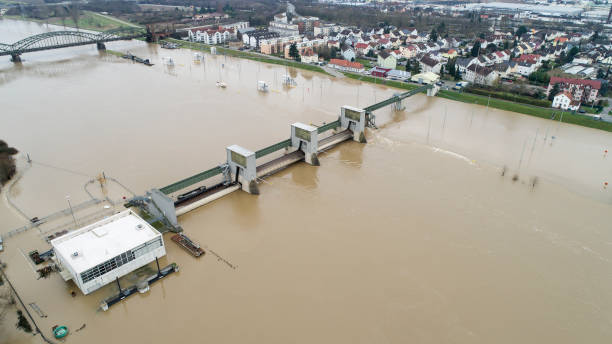istock Flooded riverbanks and water lock, River Main, Germany 903305510