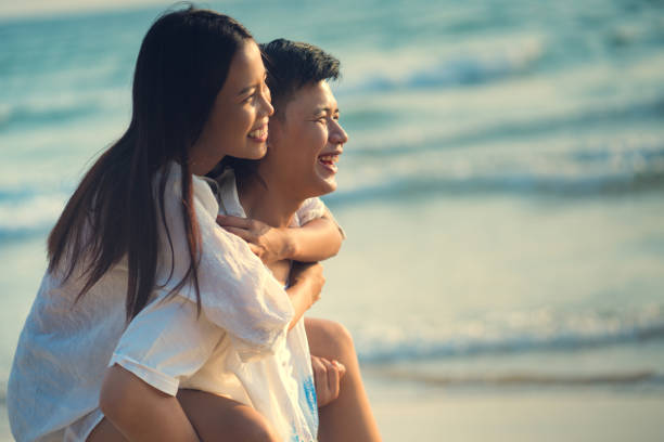 istock Couple hugging at the beach. He felt happy 903305512