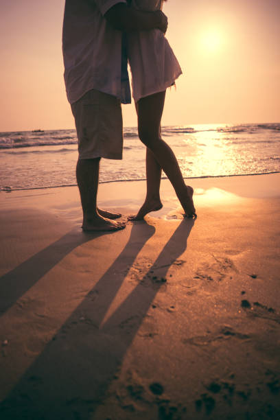 istock Imagine couple hugging and kissing on the beach 903305864