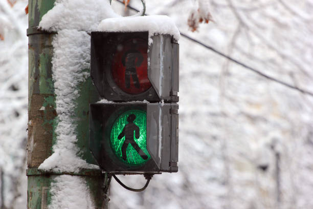 istock Old pedestrian crossing lights at wintertime 903305998