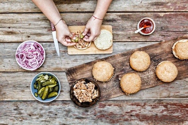 istock cooking burgers. the process of making home-burger 903308900