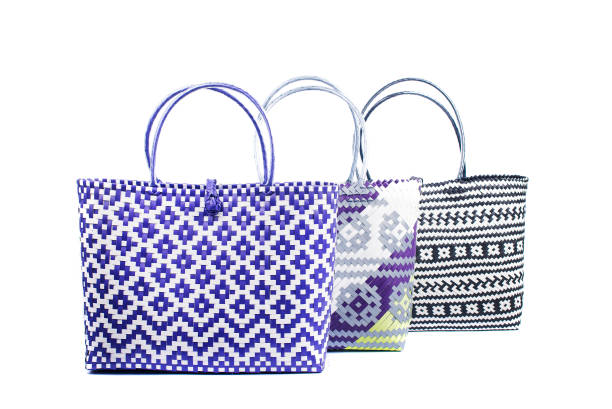 istock three wicker woman's tote bags, isolated 903309470