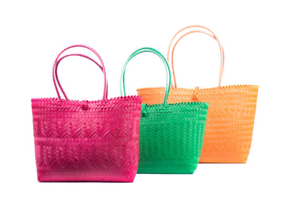 istock three wicker woman's tote bags, isolated 903309486