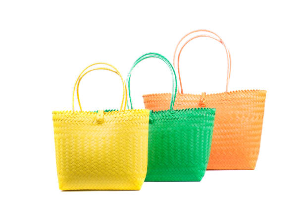 istock three wicker woman's tote bags, isolated 903309494