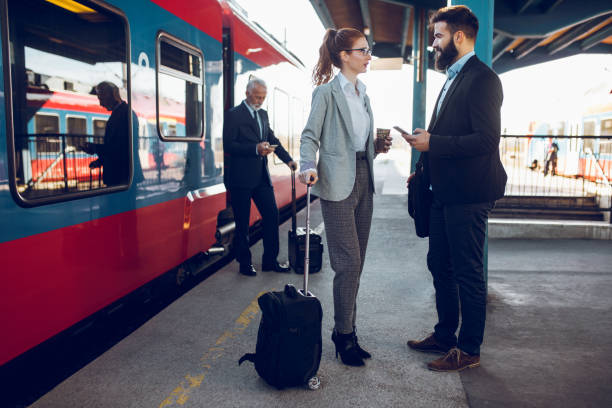 istock Group of people on the platform at train station 903310338
