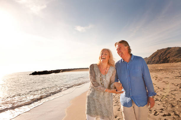 istock Happy couple on beach 8 903312688