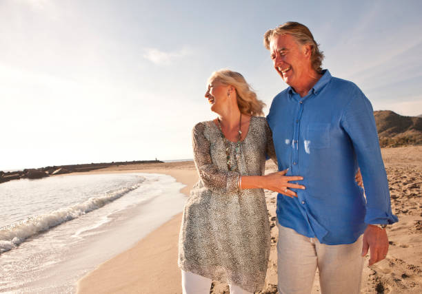 istock Happy couple on beach 4 903313410