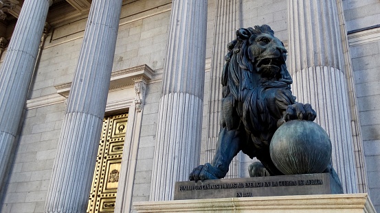 Lion sculpture at the front facade with pillars