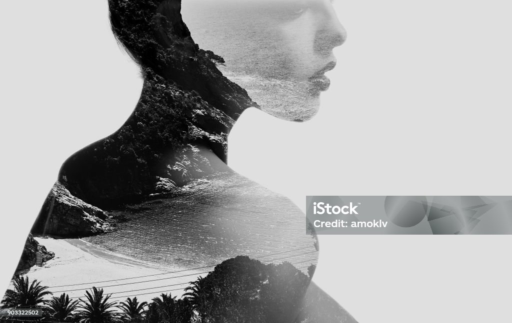 Double exposure. Black and white. Silhouette of a naked woman combined with a tropical beach and sea. Double exposure. Black and white. Women Stock Photo