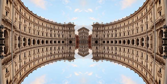 Rome, Italy – December 14, 201: photography showing buildings from the Piazza della Republicca. The photography showed an optical illusion created with a mirror effect. The photography was taken from the city of Rome, Italy.