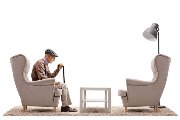 istock Lonely senior sitting in an armchair 903323316