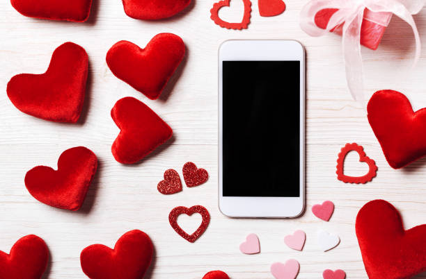 istock Smartphone mock up template for Valentine's day with heart shapes 903343826