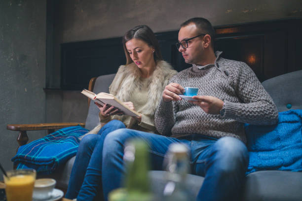 istock Couple Of Students Learning At Home On A Sofa 903350344